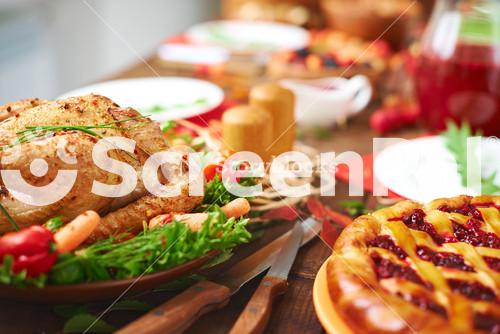 Roasted Meat With Garnish And Cowberry Pie On Festive Table